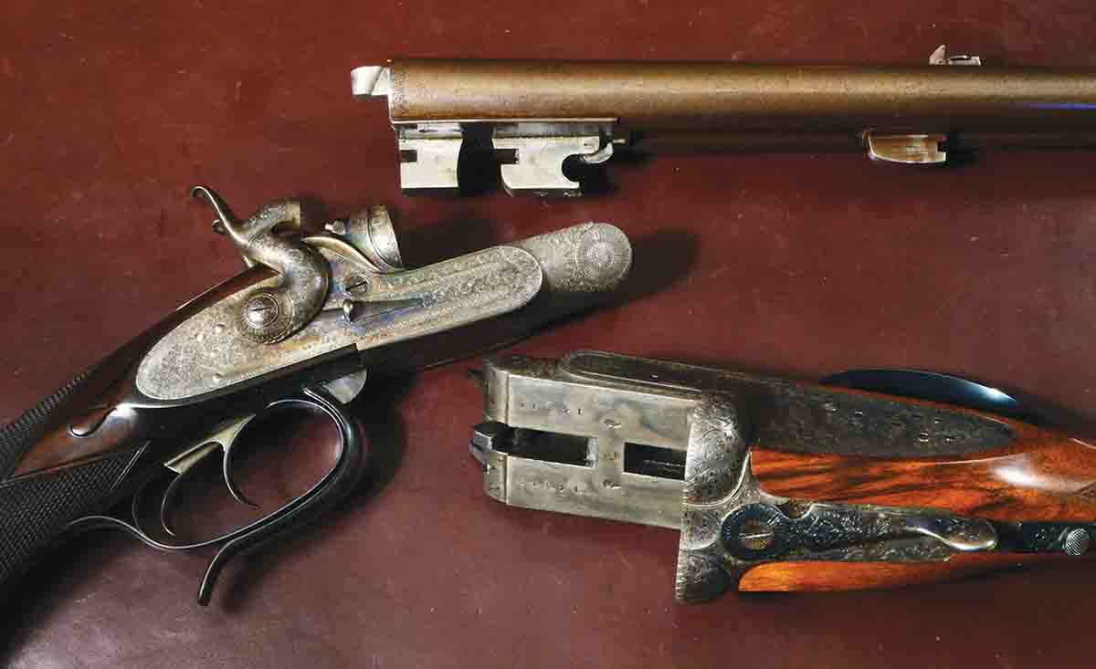 The James Woodward double rifle (top) dates from around 1874. It uses Purdey underlugs operated by a Daw underlever. Below it is the frame of an H.J. Hussey double gun, showing the top lever that has become ubiquitous.